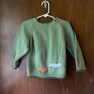 Green car sweater